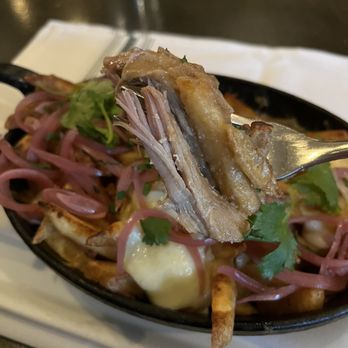 The Gage - Lots of duck meat in Poutine Royale - New American Near Me - Chicago, Illinois The Gage - Lots of duck meat in Poutine Royale - New American Near Me - Chicago, Illinois