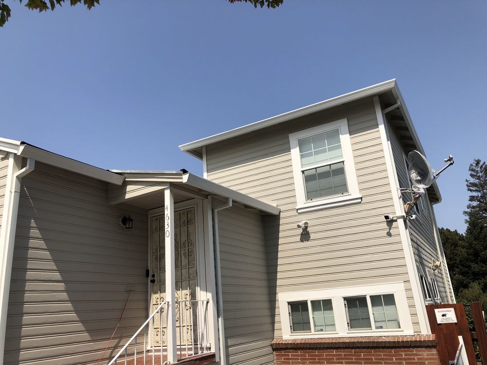 Slide of All American Roofing and Seamless Gutters