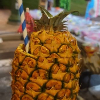Honolulu Night Market - Pineapple smoothie in a pineapple! - Festivals Near Me - Honolulu, Hawaii