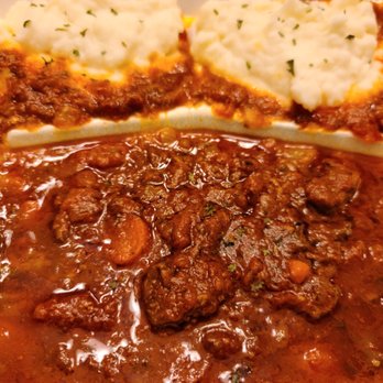 European Taste Restaurant - Beef goulash with mashed potatoes. It spilled a little on the ride home. It was very good though. - Modern European Near Me - Henrico, Virginia