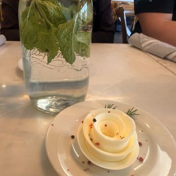 Nonni's Bistro - Water and butter served with hot bread rolls - Modern European Near Me - Pleasanton, California