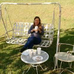 White Columns Motel - Relaxing on the swing while having breakfast.