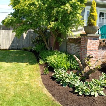 Relva Landscaping and Construction - a front yard - Landscaping Near Me