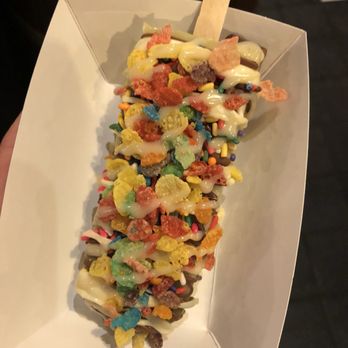 The Crab Pad - Matcha popsicle with white chocolate drizzle, topped with fruity pebbles. - Seafood Near Me - Chicago, Illinois