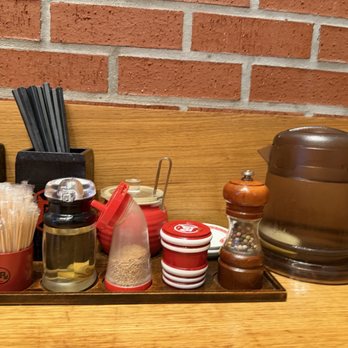 Ramen Nagi - Condiments, utensils , toothpicks , and pitcher of water with lemon - Ramen Near Me - San Diego, California