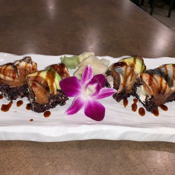 O'Sushi Canton - Imperial Roll with Black Rice garnished with a Flower.  Beautiful presentation. - Japanese Near Me - Canton, Michigan