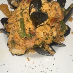 Fine Food Cuisine - I ordered the Paella it was very good well seasoned plenty of seafood my greedy self I ate the whole thing lol