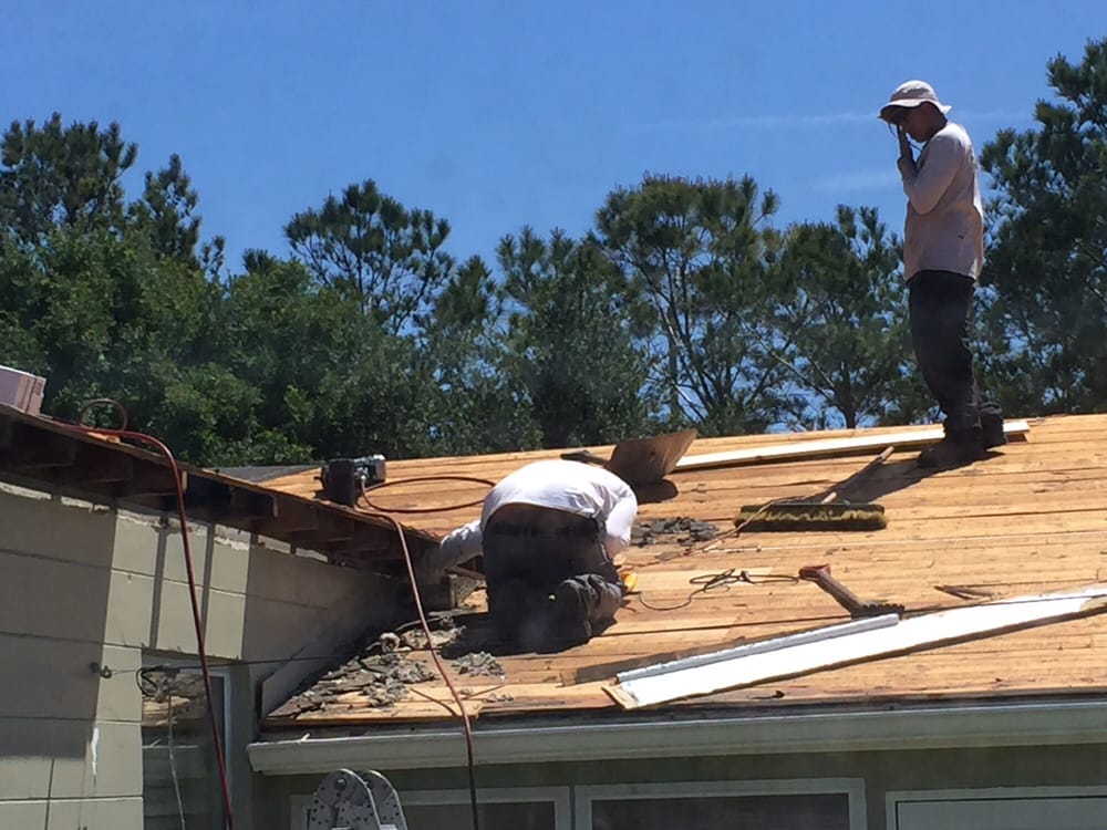 Slide of A.C.E.'S Roofing