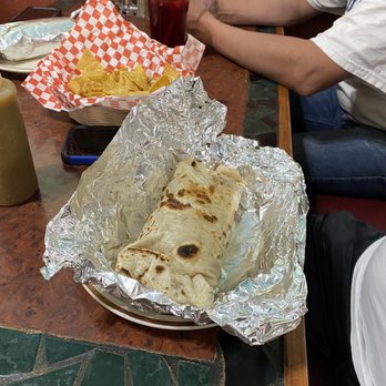 Los Potrillos - The table next to us had these incredibly large burritos They assured me they were delicious too. - Mexican Near Me - Ontario, Oregon