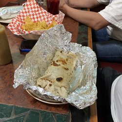 Los Potrillos - The table next to us had these incredibly large burritos They assured me they were delicious too.