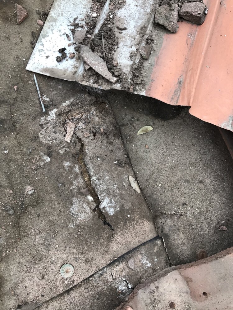 Slide of Century Roofing Company