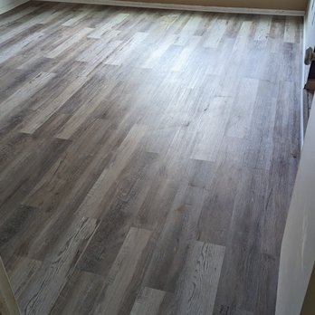 RnS Services - a hardwood floor in a home - Flooring Near Me