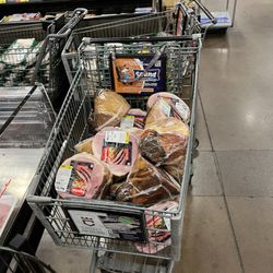Fry's Food Stores - Sitting in the middle of the floor while the person cleaned the case . Should of been taken to another refrigerator or taken to a freezer
