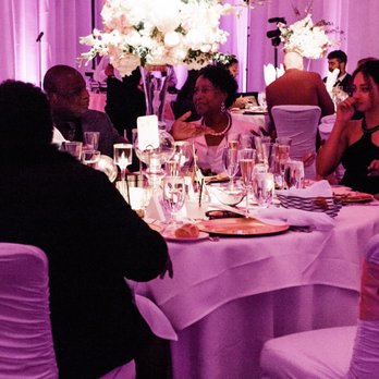 The Palette - Gorgeous flower centerpieces under spot-lighting in ballroom. - Florists Near Me - North Las Vegas, Nevada The Palette - Gorgeous flower centerpieces under spot-lighting in ballroom. - Florists Near Me - North Las Vegas, Nevada
