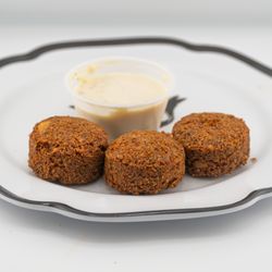 Tum Tums Mediterranean - Crispy on the outside, tender inside, our handmade falafel is packed with herbs and spices for a fresh, authentic Mediterranean bite.