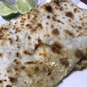 Tacos Manzanillo - This is just a piece of a giant chicken quesadilla - Food Trucks Near Me - Stockton, California Tacos Manzanillo - This is just a piece of a giant chicken quesadilla - Food Trucks Near Me - Stockton, California