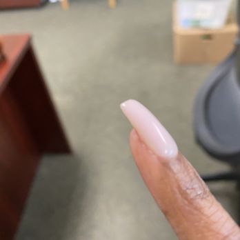 Linh's Luxe Nails - Digging into the corners if my real nail filing it off. - Nail Salons Near Me - Houston, Texas