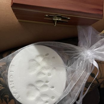 Rainbow Bridge Pets Cremations - Beautifully made paw prints and his cedar box - Pet Cremation Services Near Me Rainbow Bridge Pets Cremations - Beautifully made paw prints and his cedar box - Pet Cremation Services Near Me