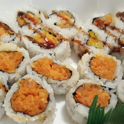 Spicy Salmon Roll (8 pieces) and Veggie Tempura Roll (8 pieces)