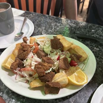 El Carbonero Restaurant - Plantain and beef with cabbage salad - Salvadoran Near Me - Santa Ana, California El Carbonero Restaurant - Plantain and beef with cabbage salad - Salvadoran Near Me - Santa Ana, California