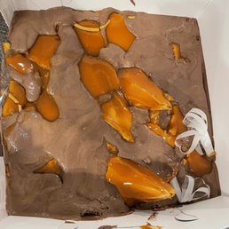 a chocolate cake with caramels