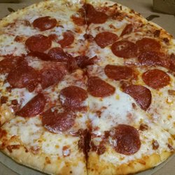 7-Eleven - $5 pie. Worth the $5 and it's ready in 2 minutes.