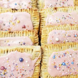 LuluBelle's Coffee House & Bakery - Scratch made hand pies filled with mixed berries and all natural dyed sprinkles