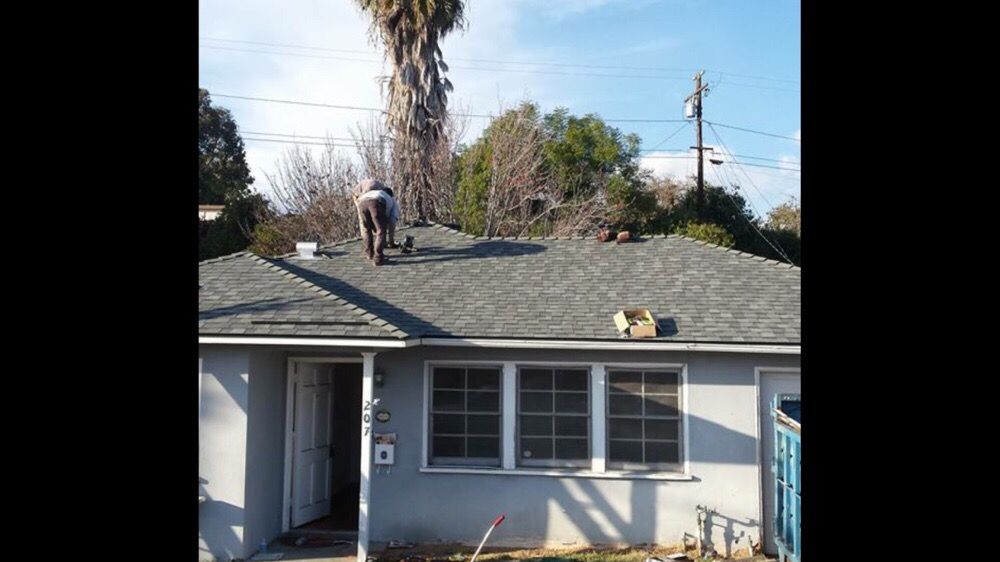 Slide of Fernandez Roofing