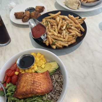 Grand Cafe - Appetizers: Avocado Rolls, Truffle Fries Entrees: Salmon poke bowl, salmon wrap w/fries - Kosher Near Me - Hollywood, Florida