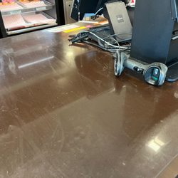 Dunkin' - Broken register equipment in disarray.
