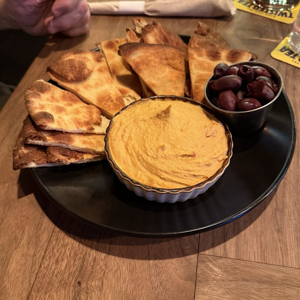 Homemade hummus and naan bread Homemade hummus and naan bread