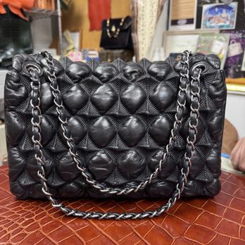 Tony's Leather Goods - After- he ended up having to fill about 50 of the bubbles with new filling - Leather Goods Near Me - Beverly Hills, California Tony's Leather Goods - After- he ended up having to fill about 50 of the bubbles with new filling - Leather Goods Near Me - Beverly Hills, California