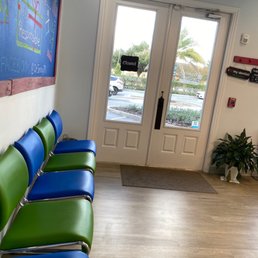 Entrance with partial view of waiting area Entrance with partial view of waiting area