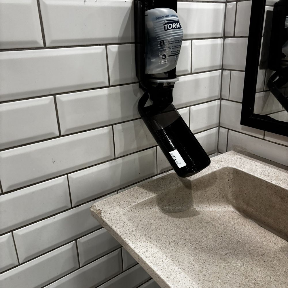 Applebee's Grill + Bar - Broken soap dispenser attempted to close and use the soap. Nothing came out. - American Near Me - Rock Hill, South Carolina