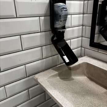 Applebee's Grill + Bar - Broken soap dispenser attempted to close and use the soap. Nothing came out. - American Near Me - Rock Hill, South Carolina