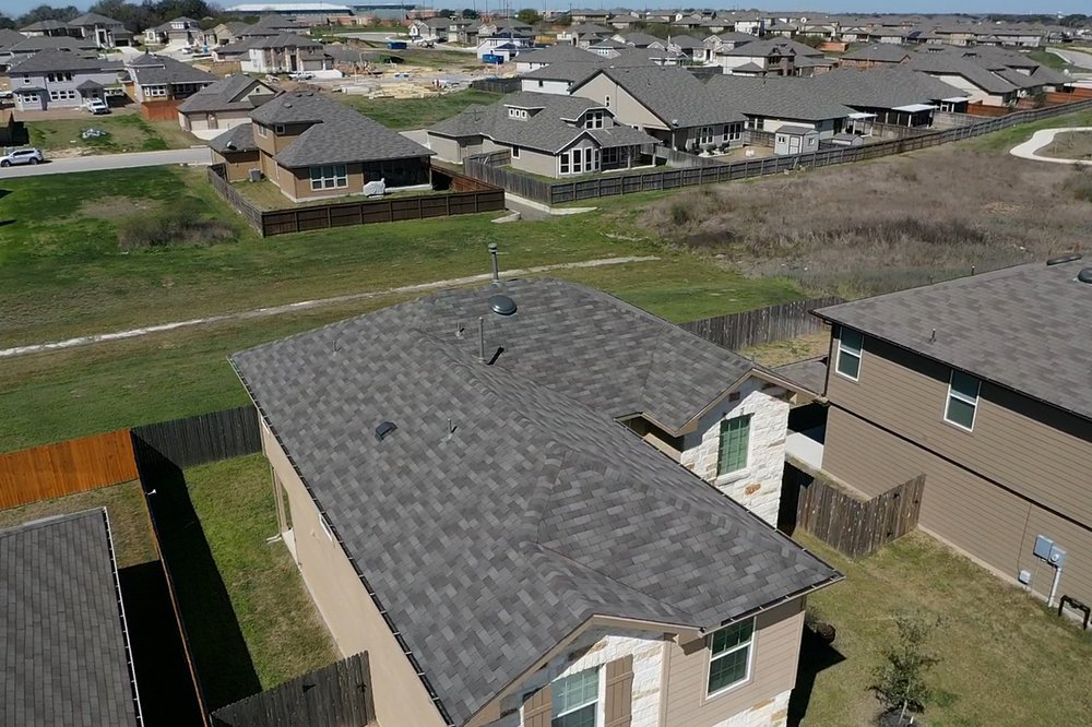 Slide of Rooftop Roofing And Remodeling