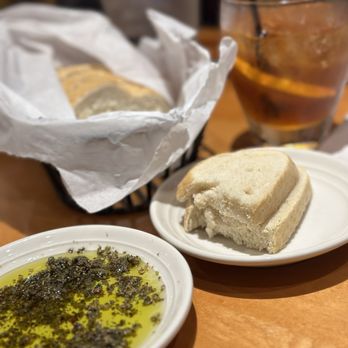 Carrabba's Italian Grill - Bread, herbs and oil - Italian Near Me - Houston, Texas