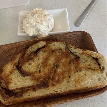 VanBrocklin's Bistro - Italian herb sourdough with caramelized onion goat cheese bread - New American Near Me - Burnet, Texas