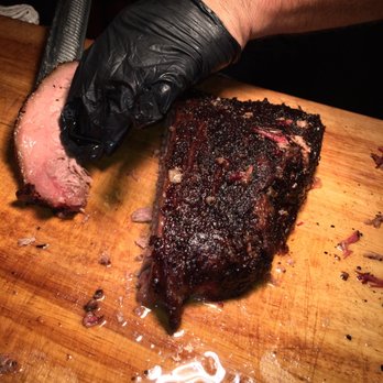SOBEWFF - John Rivers himself slicing up his Smoked Brisket. - Festivals Near Me - Miami Beach, Florida SOBEWFF - John Rivers himself slicing up his Smoked Brisket. - Festivals Near Me - Miami Beach, Florida