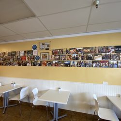 Cochi's Kitchen - Photo wall of Customers.