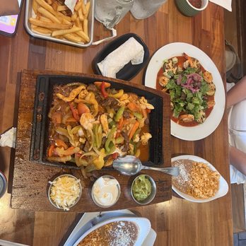 Mi Sabor Mexican Kitchen - The Trio Fajitas Steak and Shrimp Chefs plate with the kid Cheese Quesadilla - Mexican Near Me - Glendora, California Mi Sabor Mexican Kitchen - The Trio Fajitas Steak and Shrimp Chefs plate with the kid Cheese Quesadilla - Mexican Near Me - Glendora, California