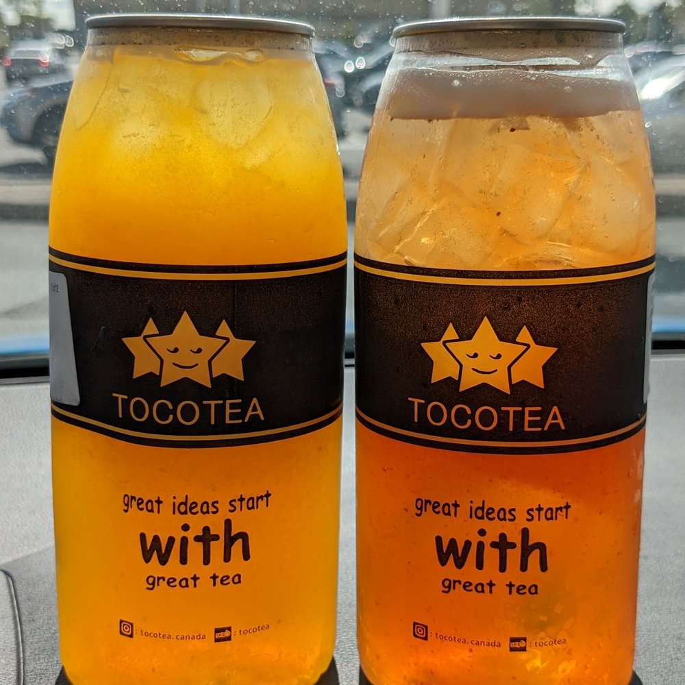 Toco Tea - Mango green tea (left), and peach and strawberry green tea (right). Both have coconut jelly. Both are large. - Bubble Tea Near Me - Vaughan, Ontario Toco Tea - Mango green tea (left), and peach and strawberry green tea (right). Both have coconut jelly. Both are large. - Bubble Tea Near Me - Vaughan, Ontario