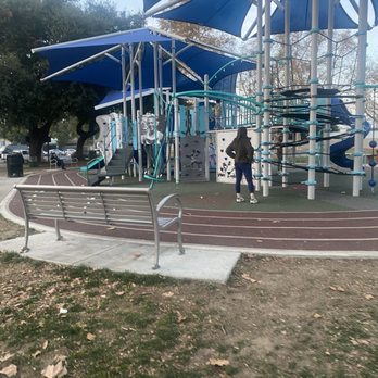 Jesse Owens Park - The playground area with no sand benches for parents and people to sit out to watch the kids. - Playgrounds Near Me - Los Angeles, California Jesse Owens Park - The playground area with no sand benches for parents and people to sit out to watch the kids. - Playgrounds Near Me - Los Angeles, California