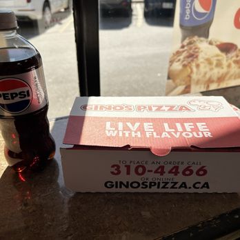Gino's Pizza - a box of pizza and a bottle of soda - Pizza Near Me - Etobicoke, Ontario