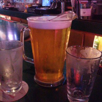 Garry's Lounge - two glasses of beer on a bar - Lounges Near Me - Lodi, California Garry's Lounge - two glasses of beer on a bar - Lounges Near Me - Lodi, California