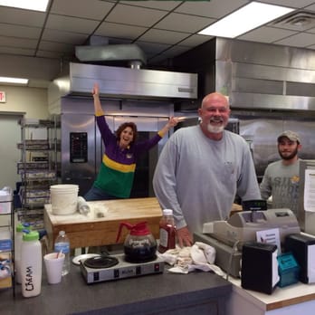 Navarre's Famous King Cakes - Ernie at the register and Michelle in the background. - Bakeries Near Me - Springfield, Louisiana Navarre's Famous King Cakes - Ernie at the register and Michelle in the background. - Bakeries Near Me - Springfield, Louisiana