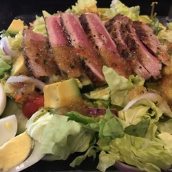 River Grille - Seared Ahi Tuna Salad with Pineapple Cilantro Vinagrette, Toasted Almonds, Avacado, Red Onion, Tomato, Boiled Egg