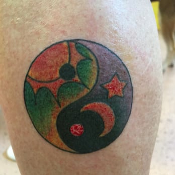 Treasure Tattoo - Dana's Ying/Yang moon and sun - Tattoo Near Me - New Orleans, Louisiana Treasure Tattoo - Dana's Ying/Yang moon and sun - Tattoo Near Me - New Orleans, Louisiana