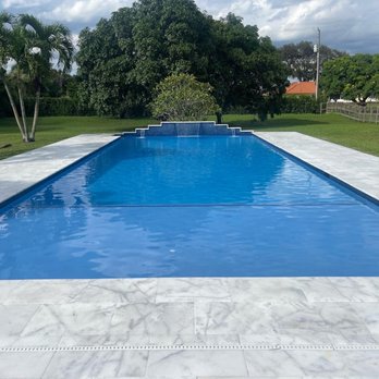 Pyramid Pool Services - Azure pool finish, marble deck, glass pool tile, led lights. - Pool & Hot Tub Service Near Me - Coral Springs , Florida Pyramid Pool Services - Azure pool finish, marble deck, glass pool tile, led lights. - Pool & Hot Tub Service Near Me - Coral Springs , Florida