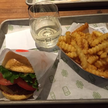 Shake Shack River North - Vegetarian burger w/glass of wine - Burgers Near Me - Chicago, Illinois Shake Shack River North - Vegetarian burger w/glass of wine - Burgers Near Me - Chicago, Illinois
